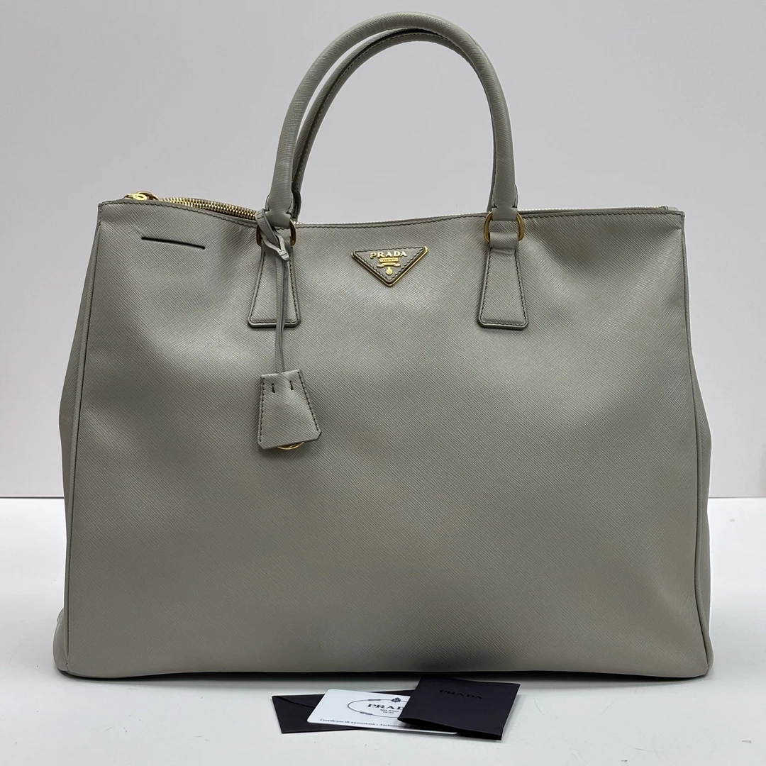 95新 Prada/普拉达 金扣十字纹牛皮手提斜挎杀手包 12720