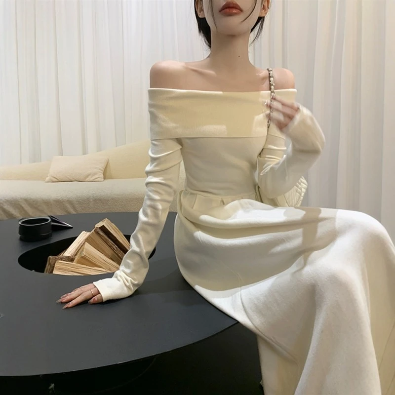 白色一字肩针织连衣裙女秋装冬内搭高级感千金穿搭毛衣长裙小礼服