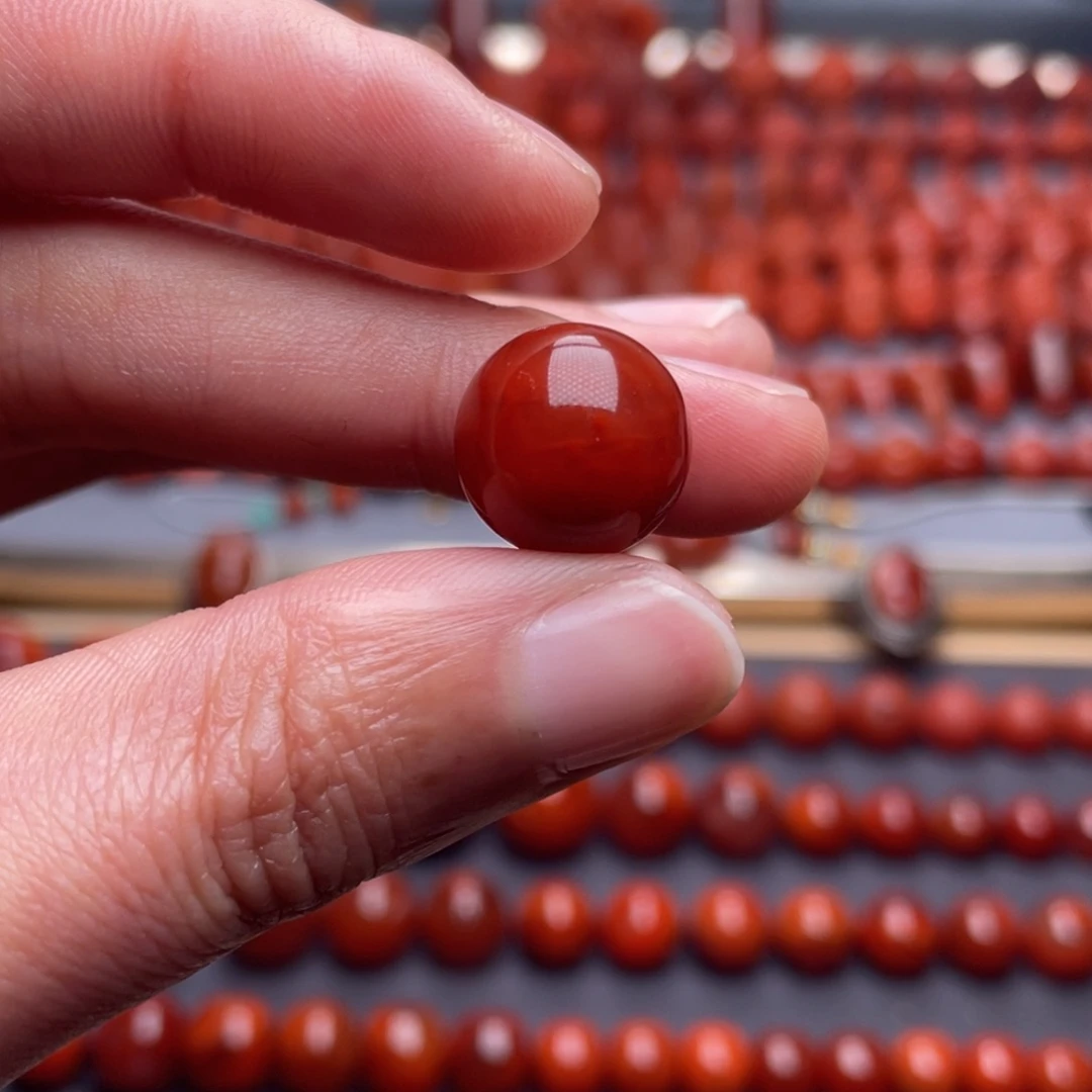 壹***雨南红玛瑙未镶嵌其他W13.3原矿瓦西双色圆珠