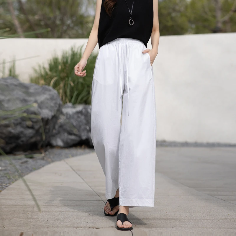 日系慵懒风白色气球裤弯刀裤女夏文艺风九分宽松遮胯休闲哈伦裤子