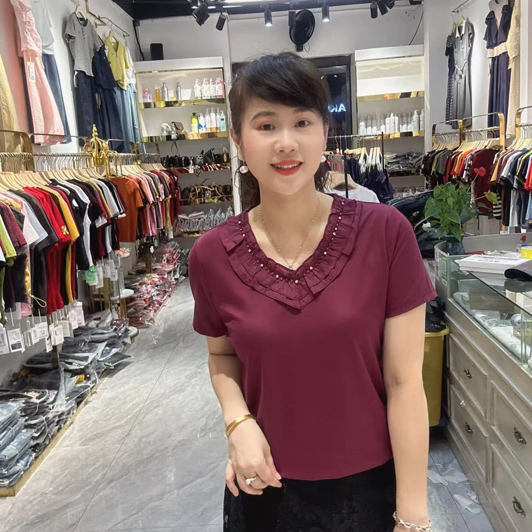 34～9515显瘦V领上衣长58公分