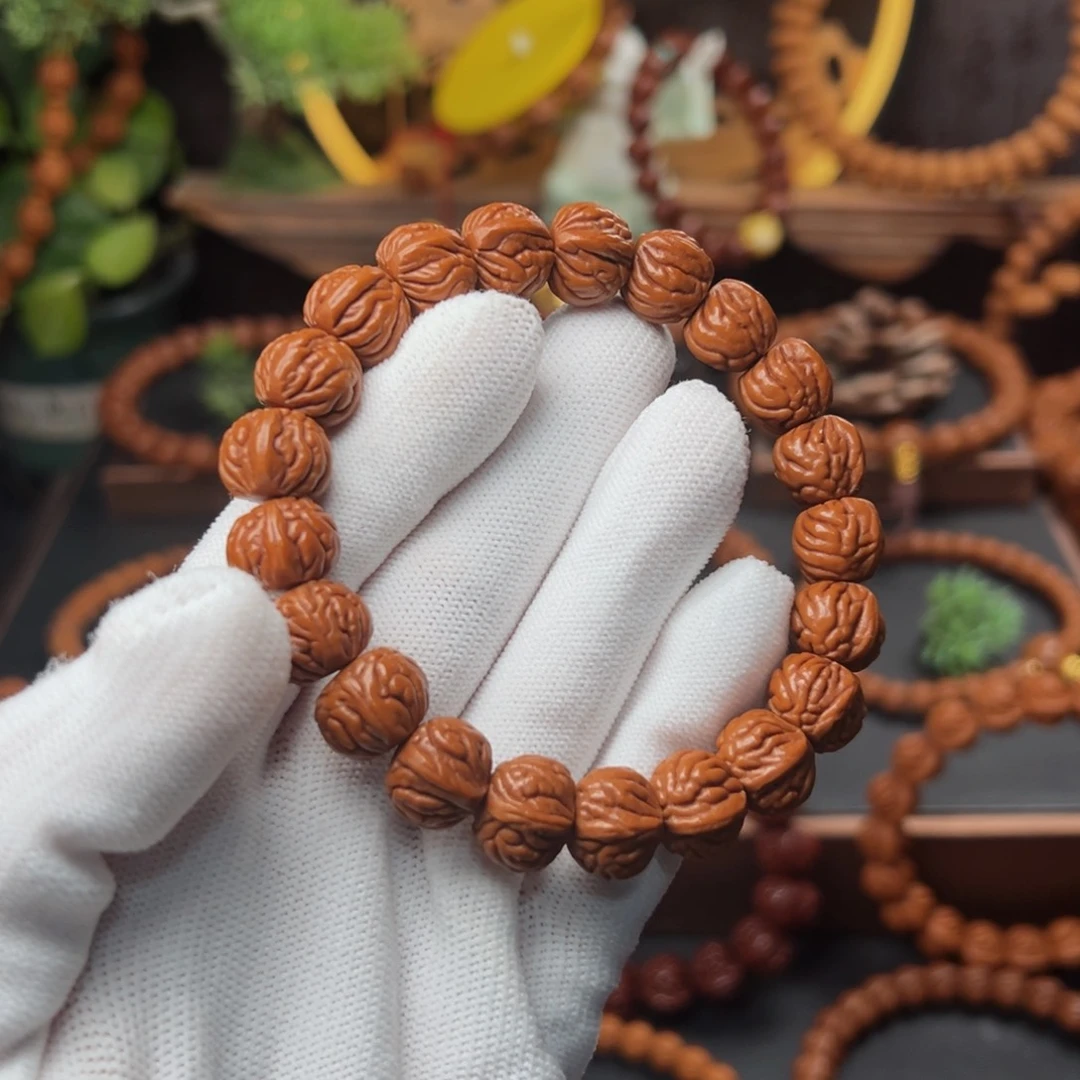 吊坠桃核I***N1.3双脊龙手串