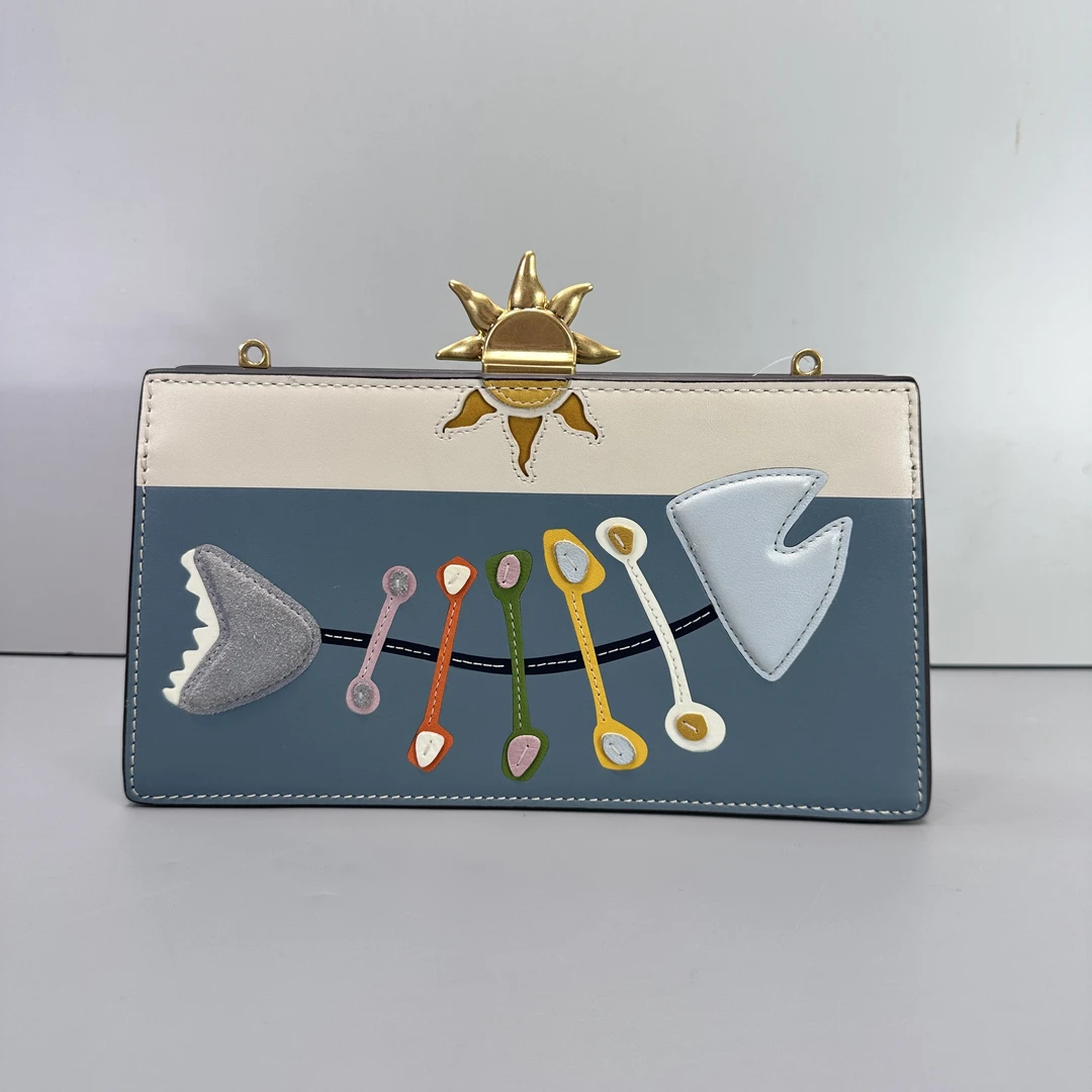 95新 TORY BURCH/汤丽柏琦 太阳扣斜挎包22x12x3cmM022508