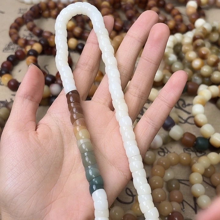 啊***洛菩提根/象牙果手串卡0.9孔道微瑕小肠