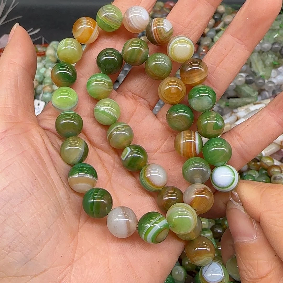 玛瑙/玉髓合金珠宝半成品黄绿玛瑙圆眼10mm一条