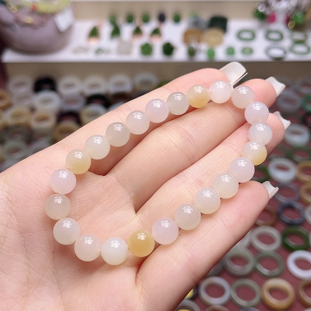 和田玉戒指未镶嵌蜂蜜水