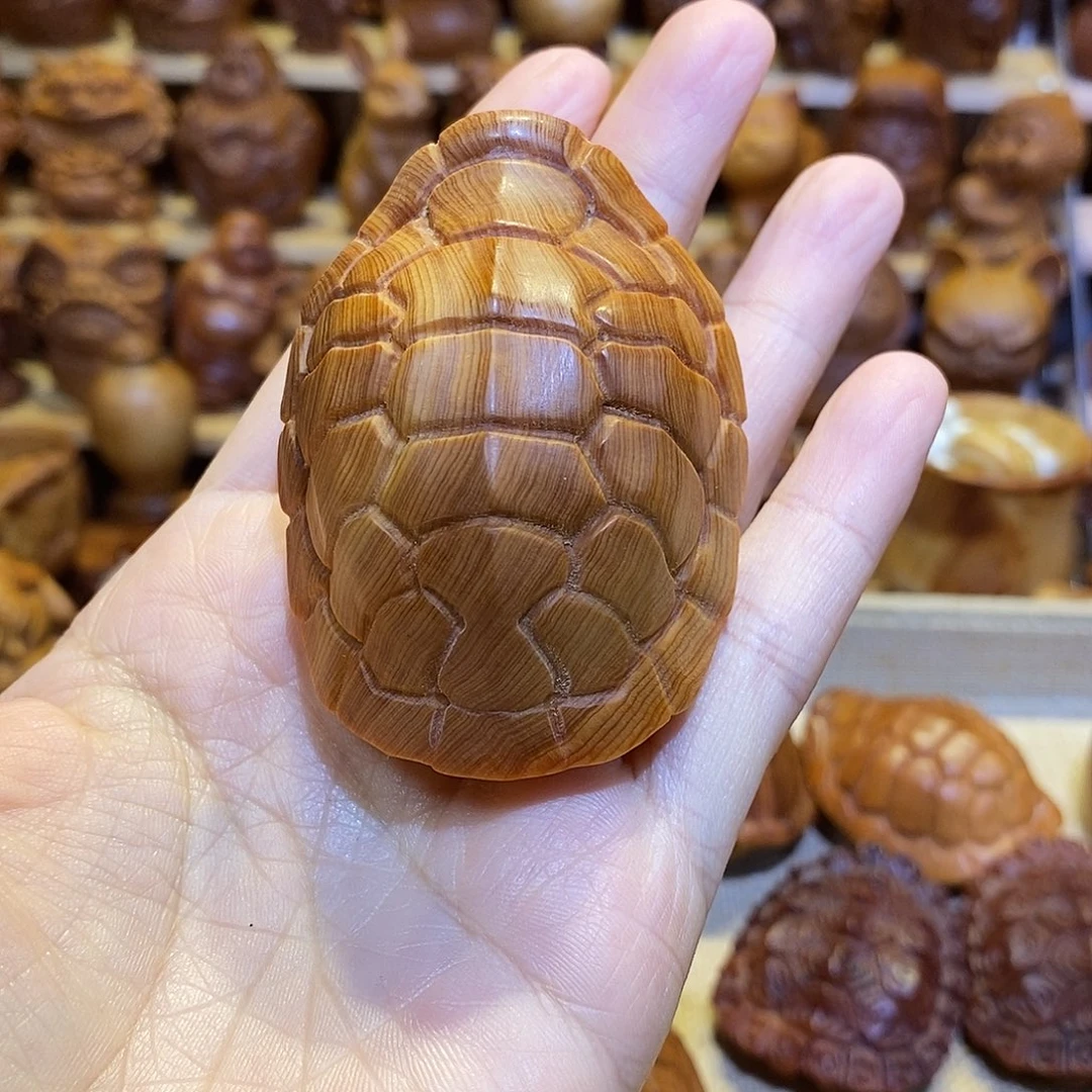 爱****木崖柏木雕手把件富甲