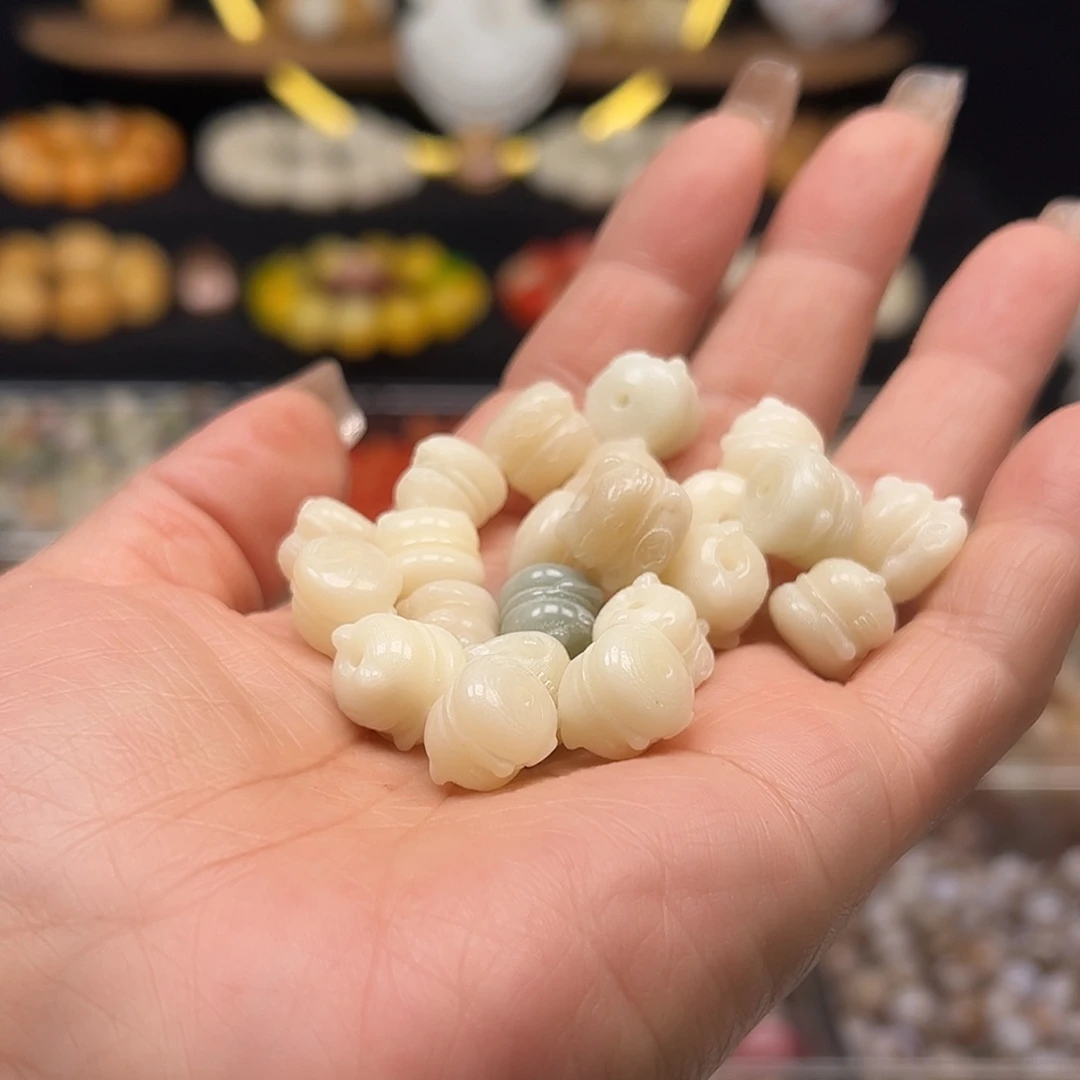 耿***钰菩提根/象牙果手串微瑕猫25颗