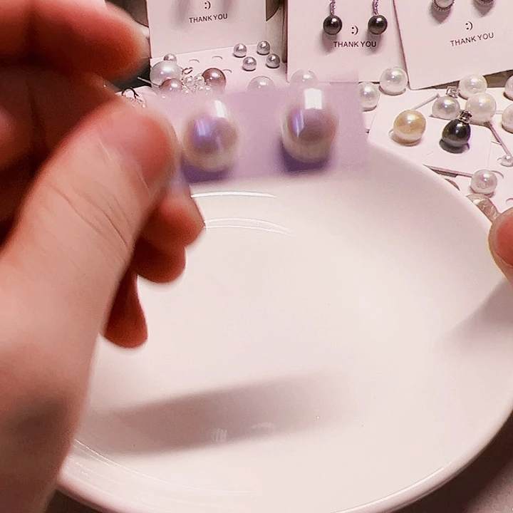 姗***姗淡水珍珠银S925镶嵌耳饰