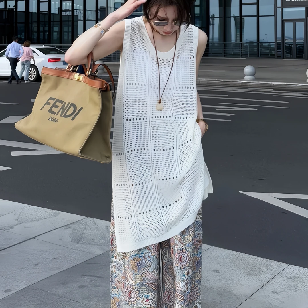 韩系镂空无袖针织罩衫女夏季2025新款宽松显瘦慵懒风时尚背心上衣