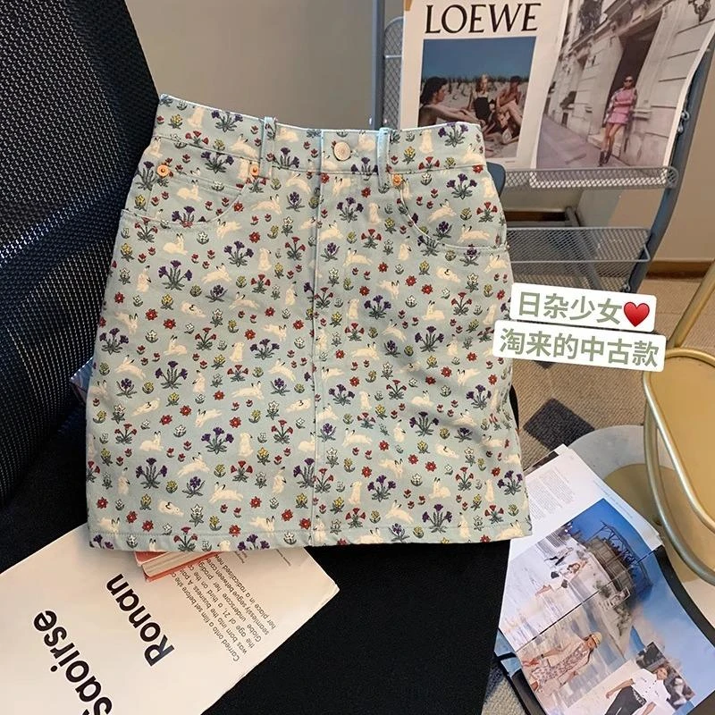 辣妹设计感碎花牛仔半身裙女2025夏季新款高腰a字包臀裙显瘦短裙