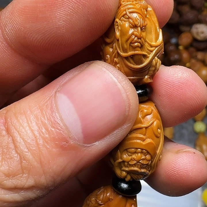 橄榄核手串你的电话