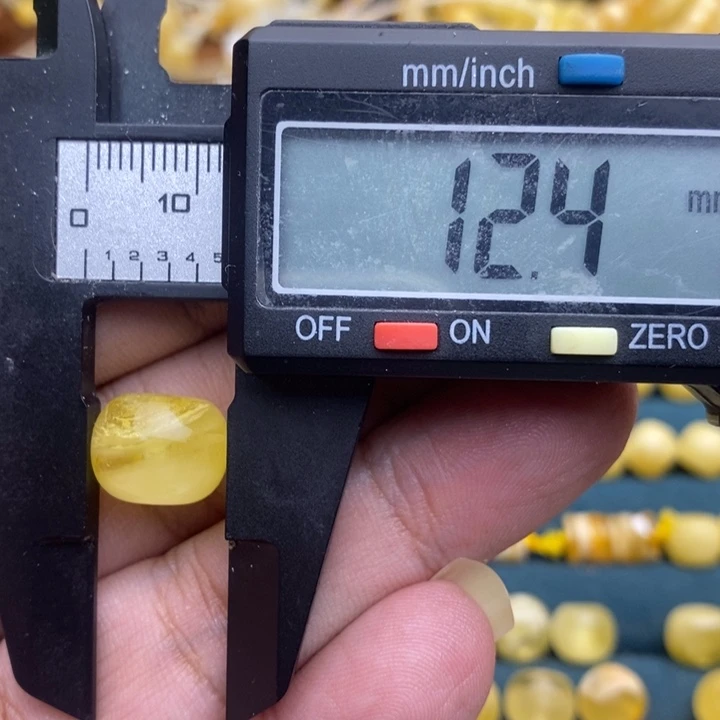 琥珀未镶嵌裸石56号12.4*9.7喇叭口微瑕