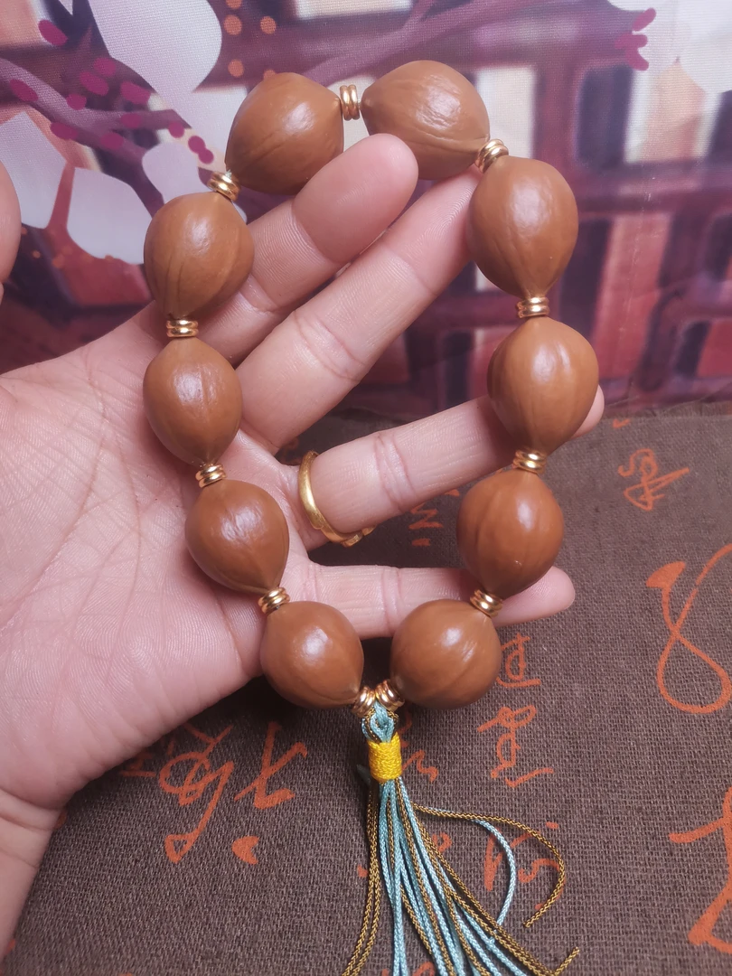 橄榄核铁三面佛手串 1.9