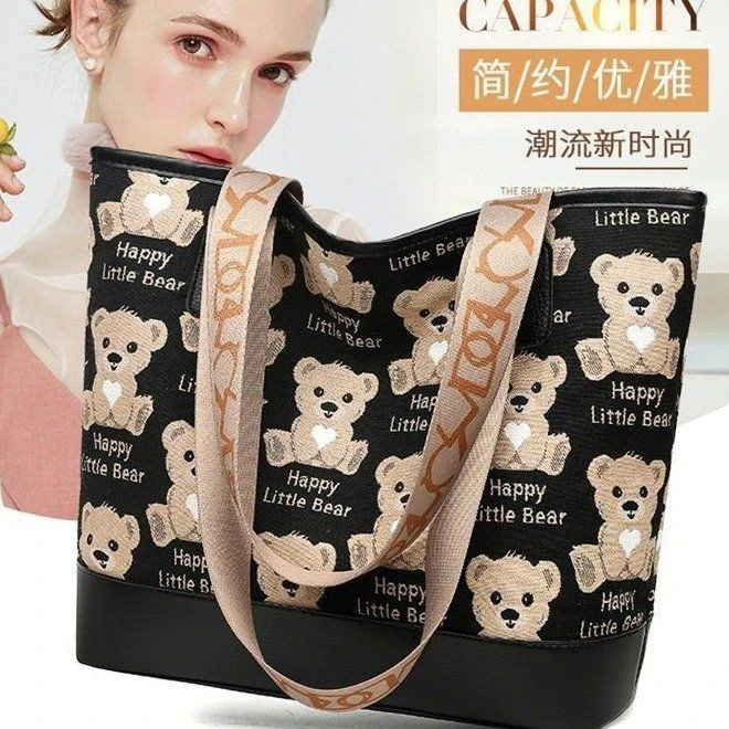 日系大容量帆布包手提单肩包上班通勤学生书包小熊包包潮韩版mmv