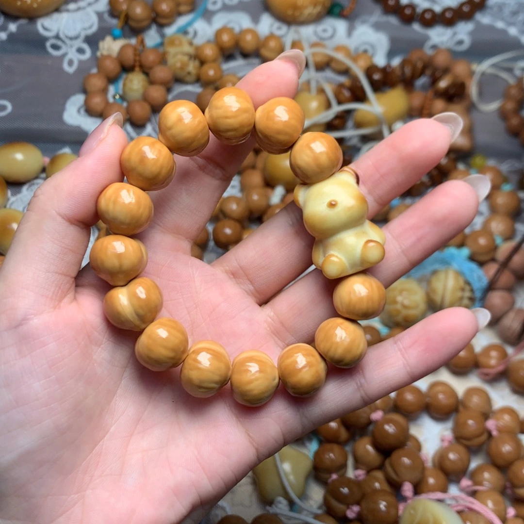 华****吊坠猴头核桃屁桃手串小熊