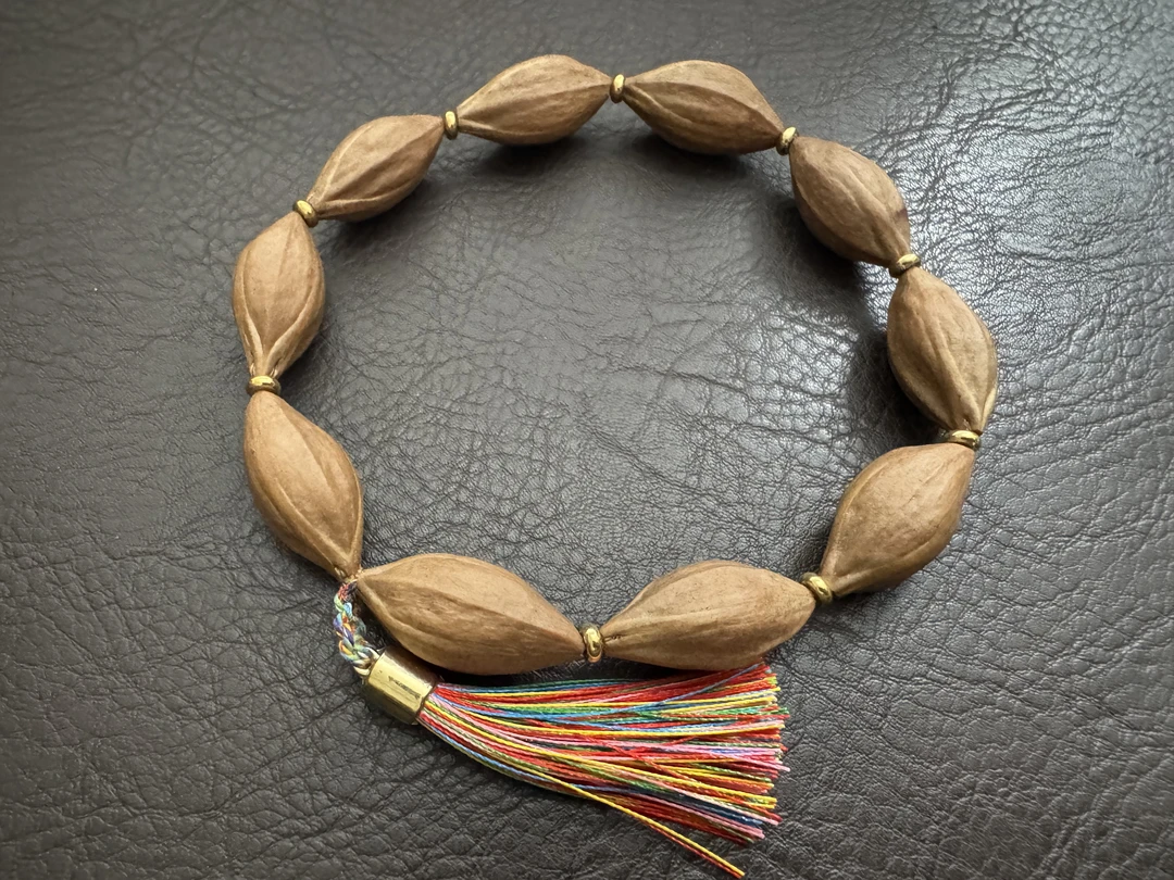 y0725-02原皮橄榄核手持约14mm约32g
