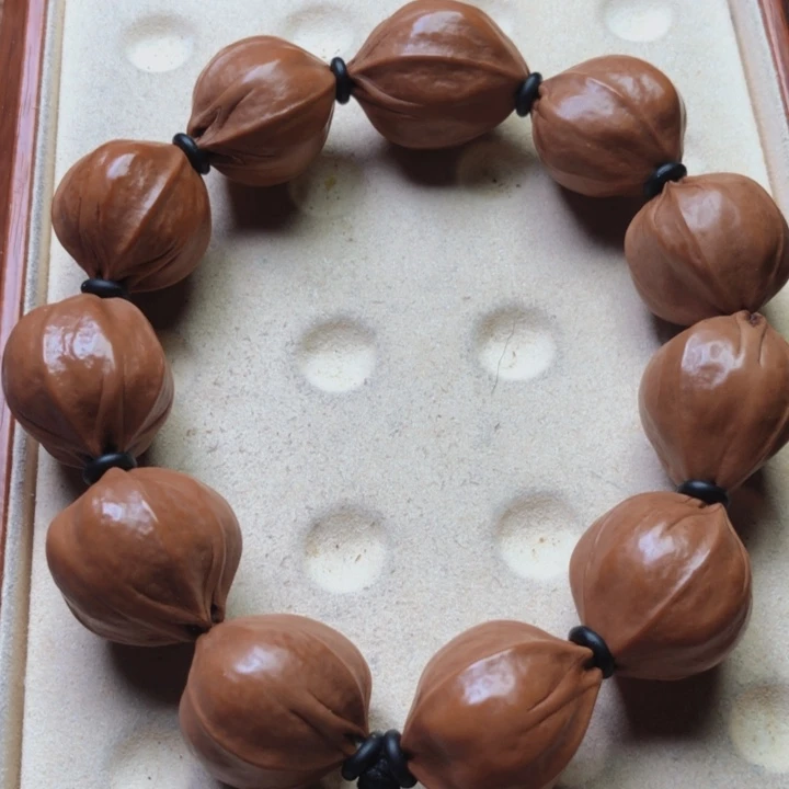 橄榄核手串梅林铁21 X23四花