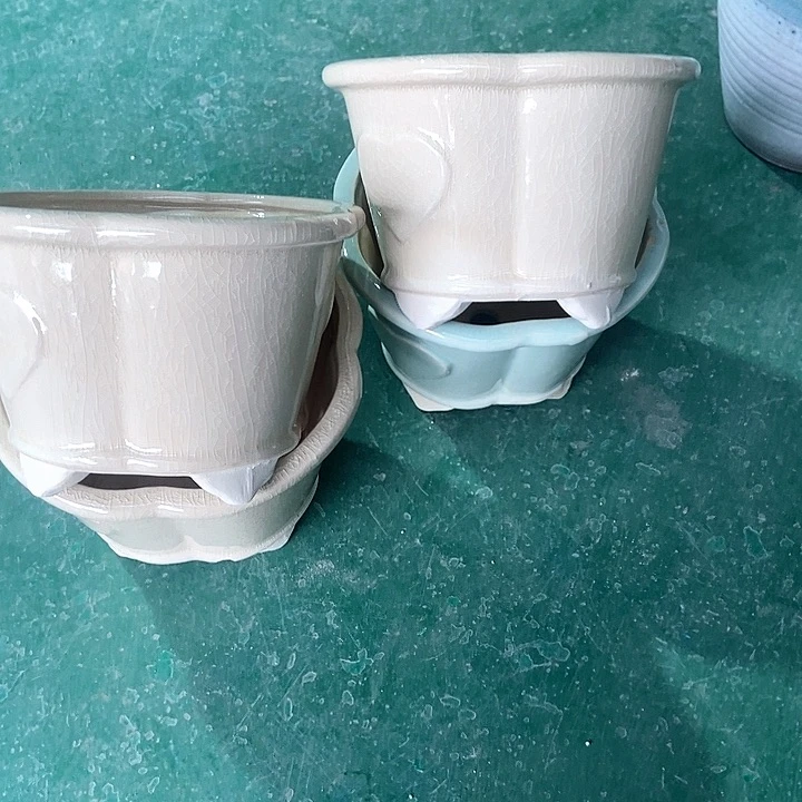 红陶口16。高11。。。