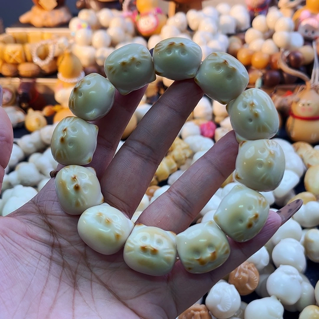 手串菩提根/象牙果叮当猫八五折孤品