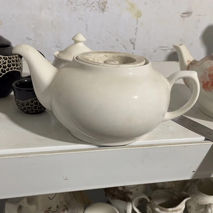 瓷片力力底标强化瓷鹰嘴壶一个
