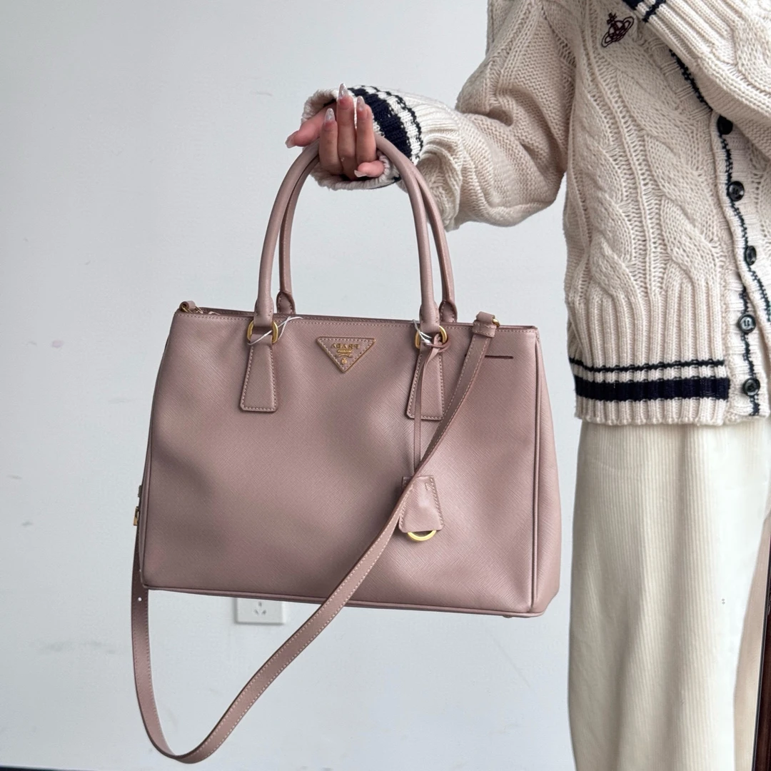 95新 Prada/普拉达 prada优雅粉杀手手提斜挎包