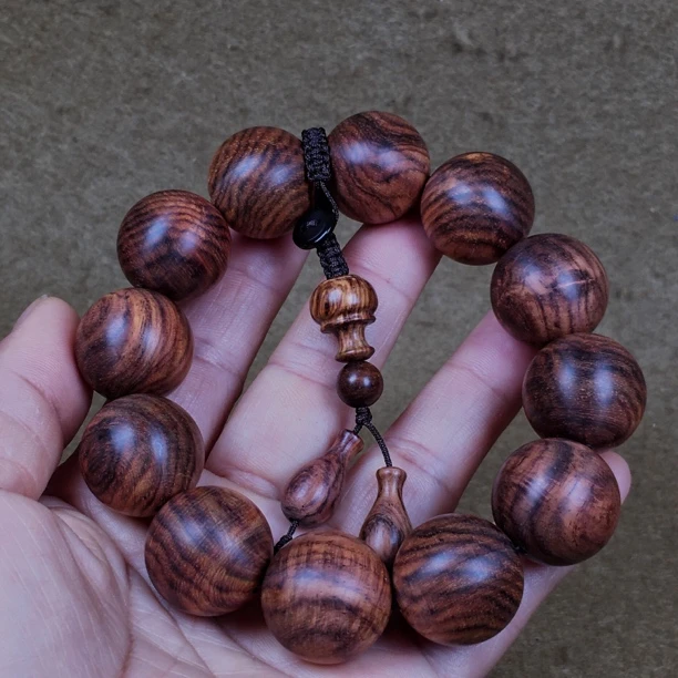 海黄油梨老料手串2.0 乱纹水波重量53.7克