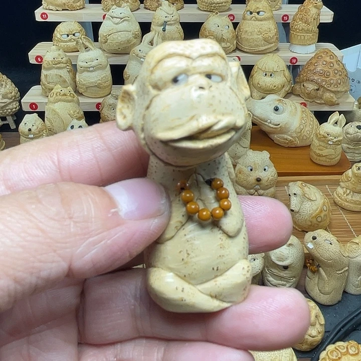 竹竹根雕猴子手把件