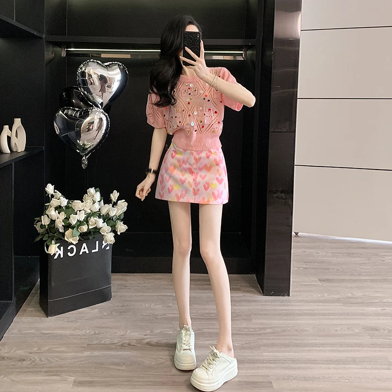 多巴胺休闲运动套装女夏季减龄镂空针织短袖爱心牛仔短裙两件套潮