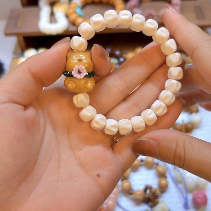 星月菩提手串牛骨百香籽10mm象牙果熊