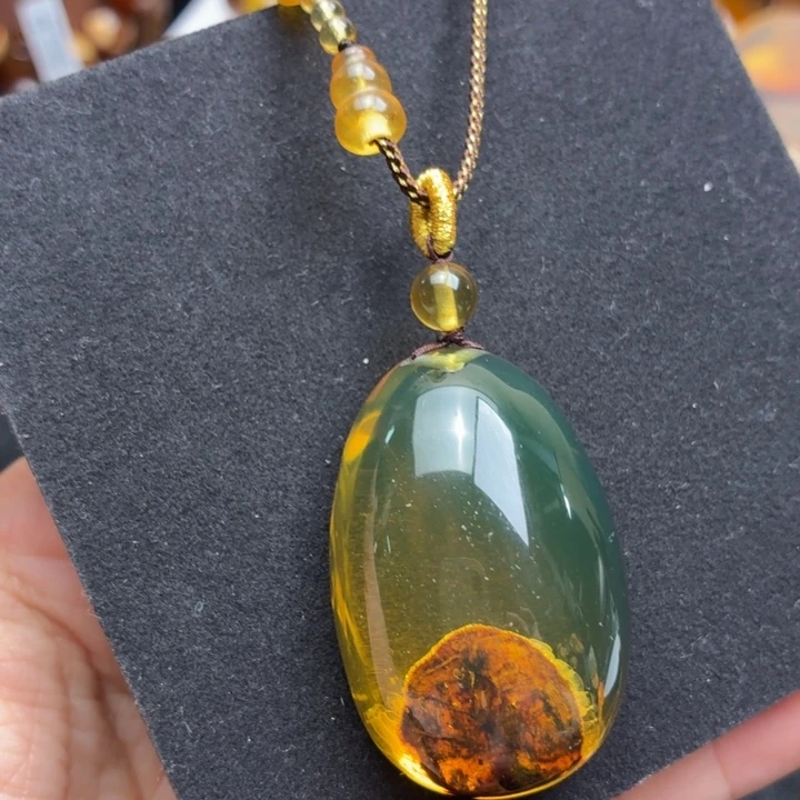 琥珀未镶嵌珠宝奇石黄茶变色植物意境水滴（16.27克