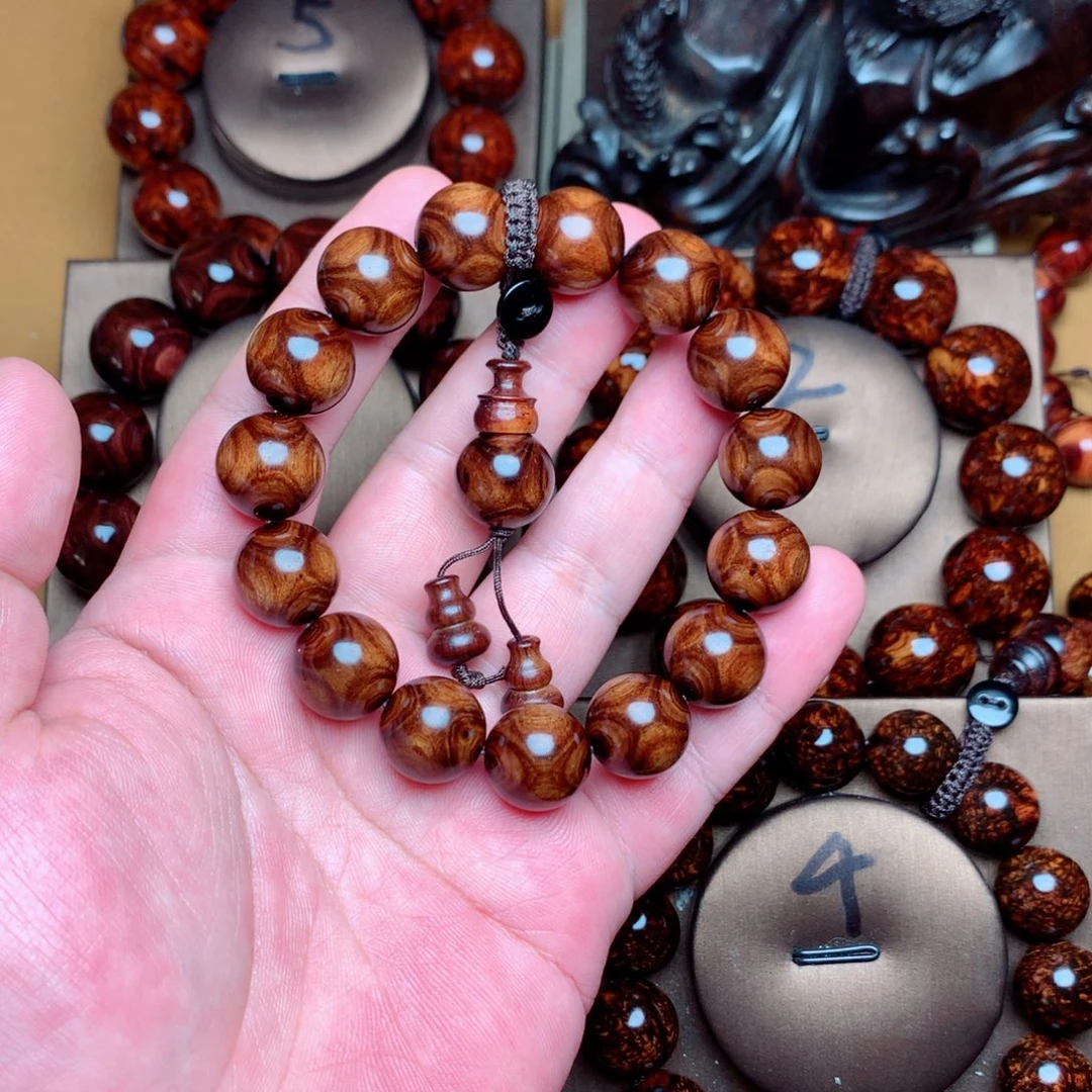 黄花梨/降香黄檀1.5对眼鬼脸