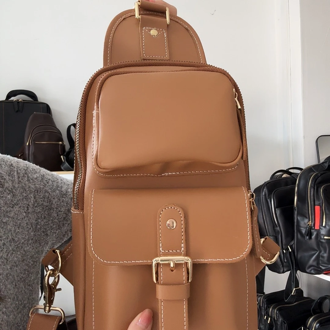 头层牛皮棕黄胸包