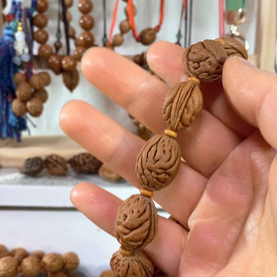 他***…桃核手串111111111