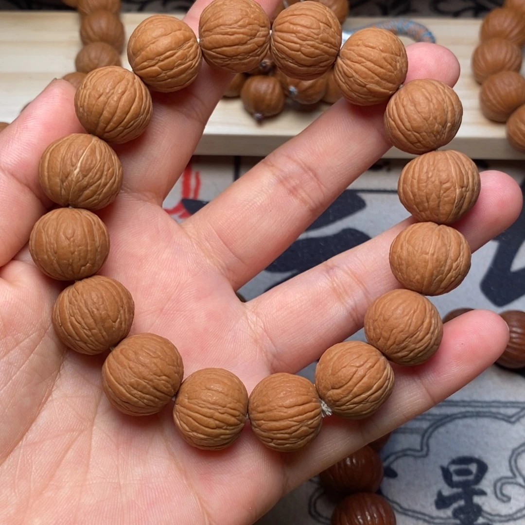 吊坠桃核原皮凤羽