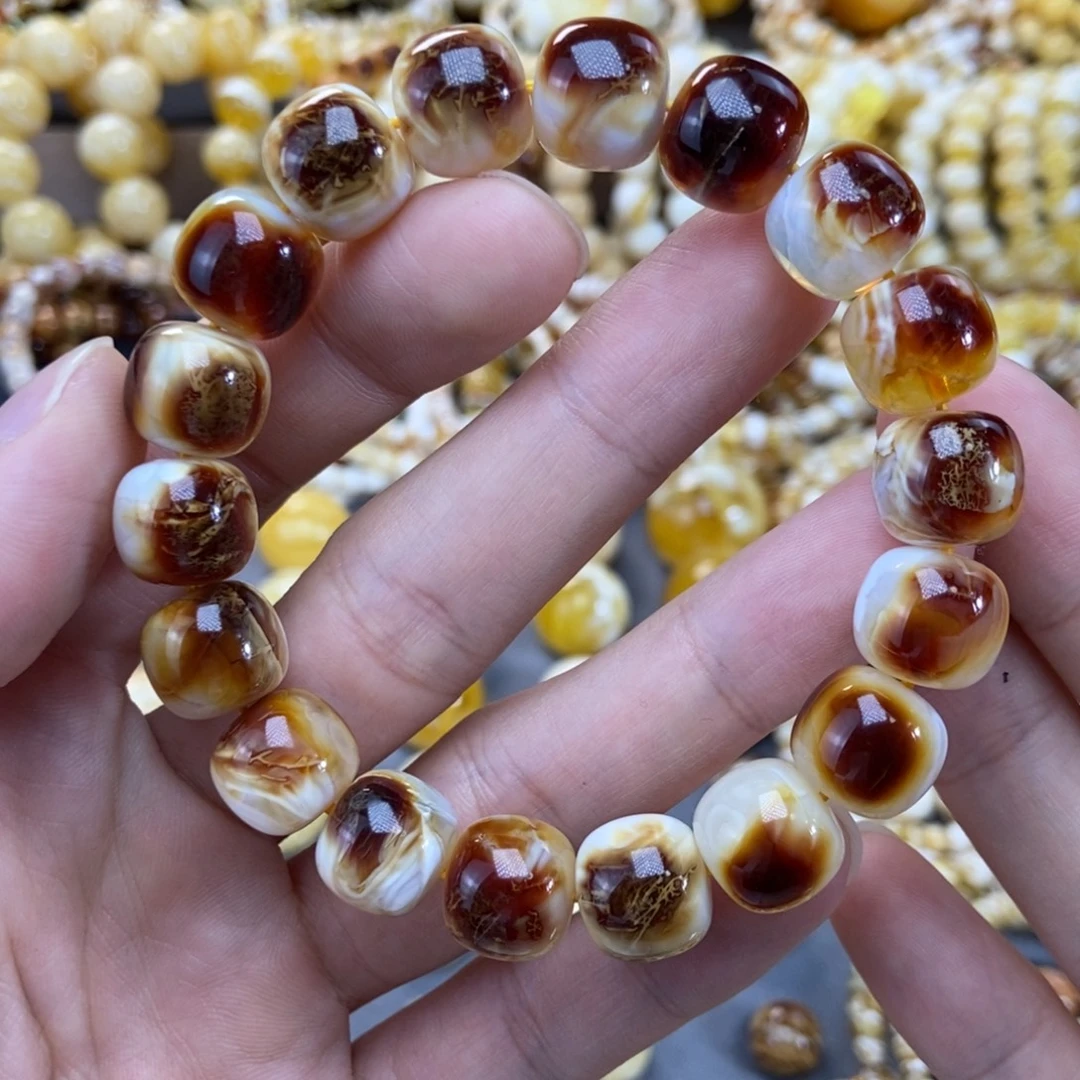 琥珀未镶嵌手链12+mm尺寸紫红沁色拉丝荧光溶洞