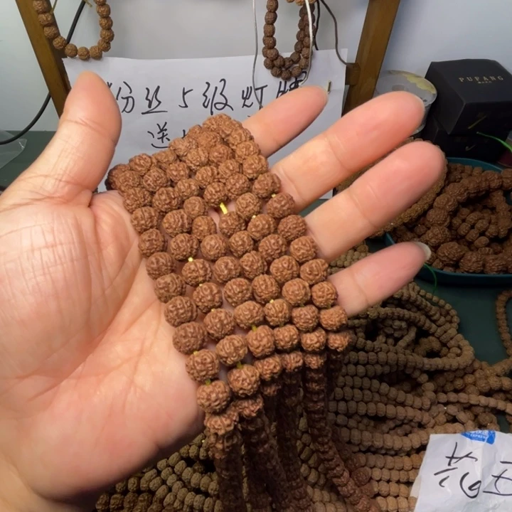 星***望手串金刚菩提红皮帝王花长串保手持