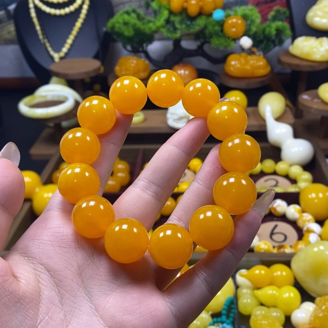 吊***妇鸡油黄卡18手串一条