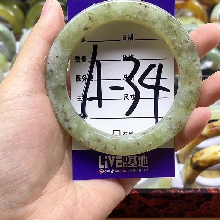 蛇纹石玉手镯合金羡****?