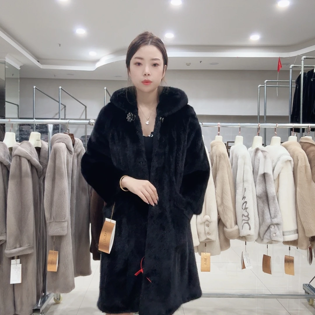 黑色明兜浪位款大衣