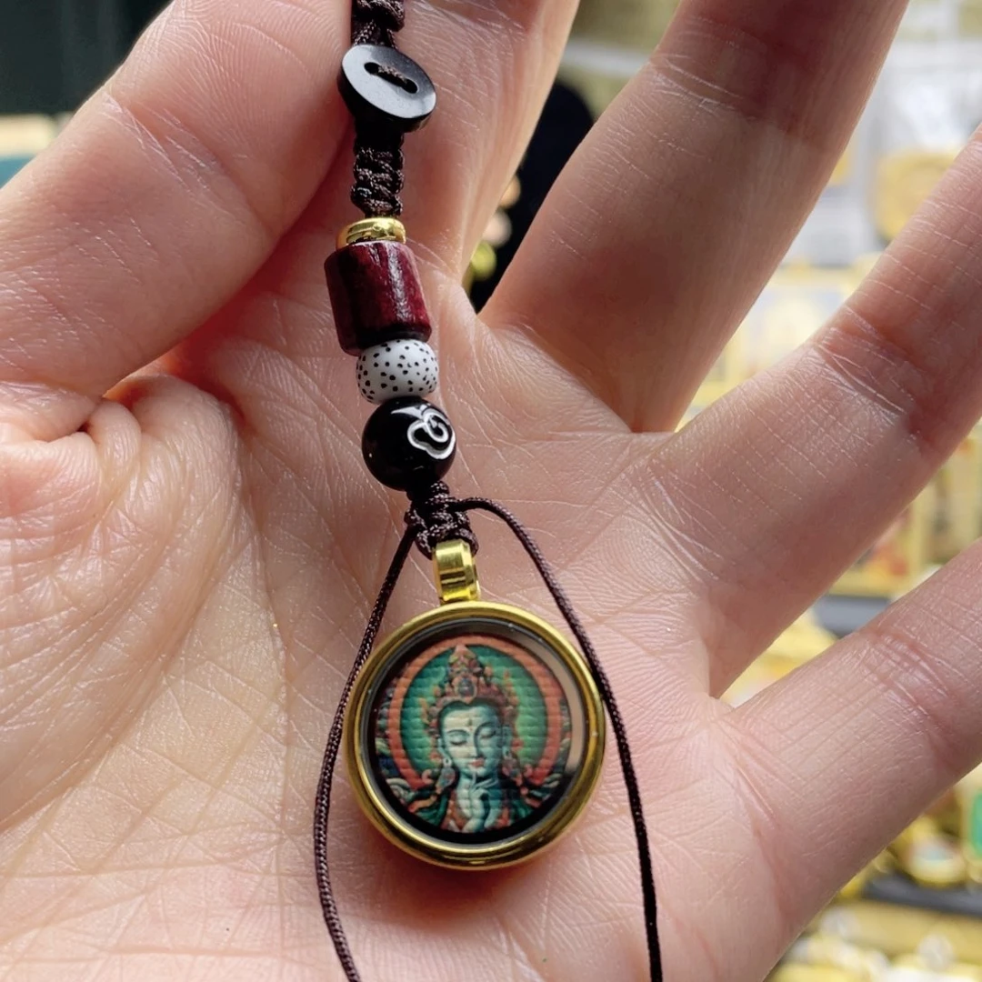 铜铁合金类唐卡等多种形式进行了介绍