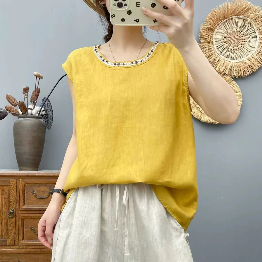 夏季新款纯雨露亚麻波西米亚风圆领珠片织带气质上衣6157X