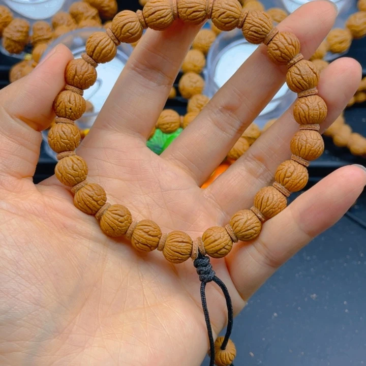 寶***桃核吊坠见健健康康平平安安9