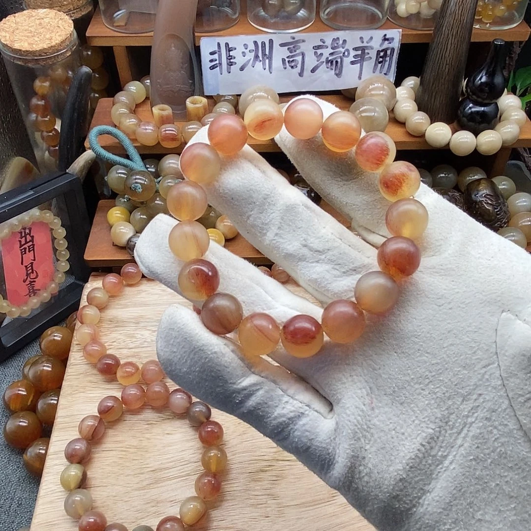 *****布艺非金属12mm精品非洲黑斑高端羊角手串