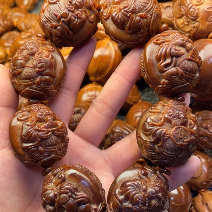 橄榄核吊坠向**奔橄榄核