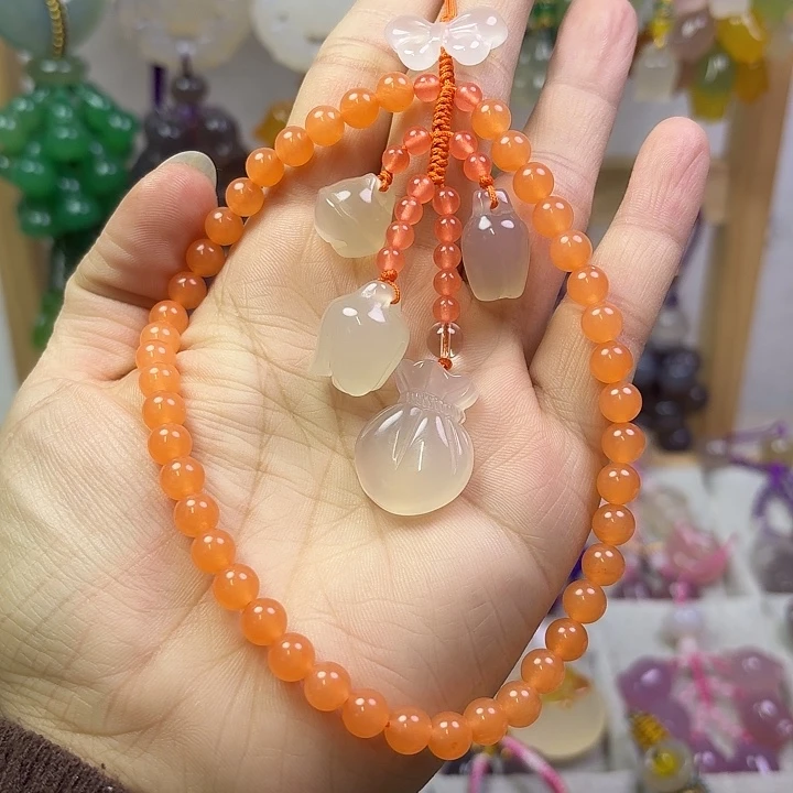 手机挂件手腕款橙色款钱袋