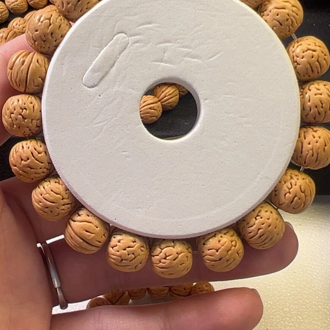 畅***帅桃核吊坠13奶油皮黄桃