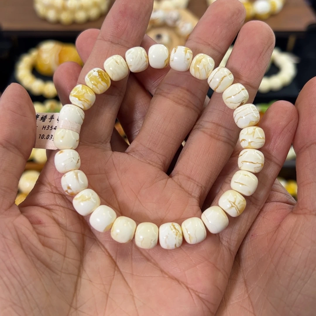 琥珀未镶嵌裸石金瓷白闪电纹老型手串