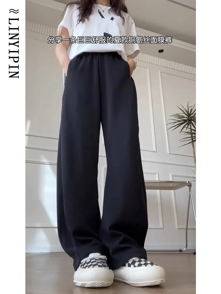 黑色铜氨丝弯刀裤女早秋垂感大码胖MM显瘦薄款冰丝阔腿香蕉镰刀裤