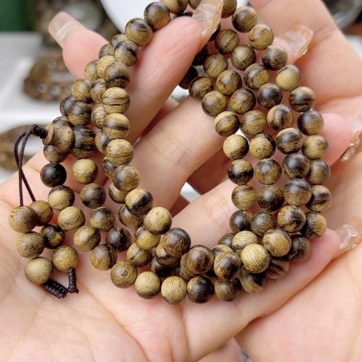 沉香手串遥***_达拉干玉化老料满留疤虎皮纹0.6×108